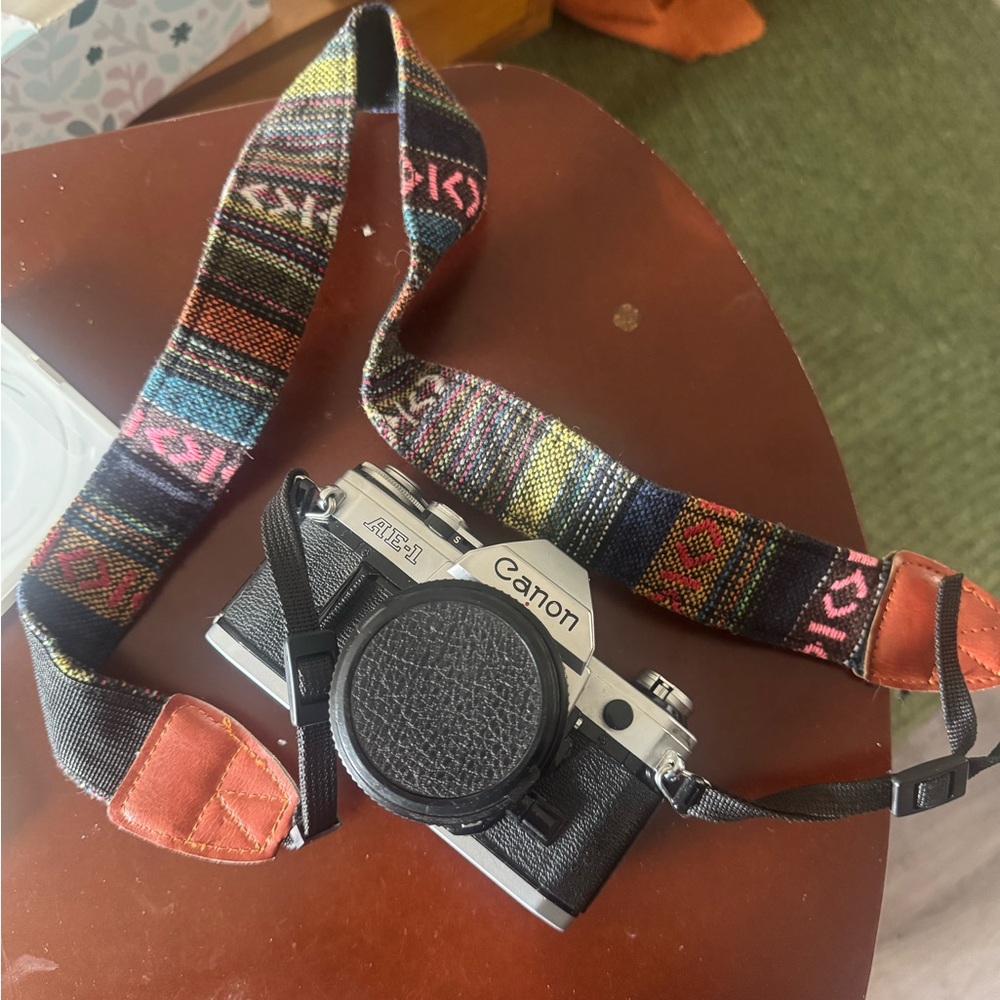 Canon AE-1 35mm Black and Silver Camera with Colorful Strap